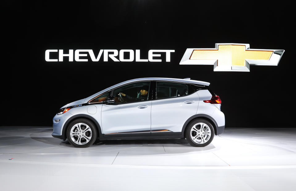 FILE - Chevrolet shows off their Chevrolet Bolt at the North American International Auto Show on Jan. 9, 2017, in Detroit. The Biden administration will propose new automobile pollution limits this week that would require at least 54% of new vehicles sold in the U.S. to be electric by 2030, ramping up quickly to as high as 67% by 2032. That's according to three people briefed on the plan. (AP Photo/Paul Sancya, File)
