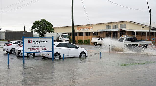 Flooding in Victoria St in Mackay's CBD after tropical cyclone Debbie hit the north Queensland region. Picture: Daryl Wright AAP