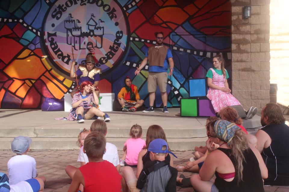 A crowd watches a Storybook Land Theatre performance on Monday afternoon at Wylie Park. The show was part of Aberdeen's Independence Day celebration.
