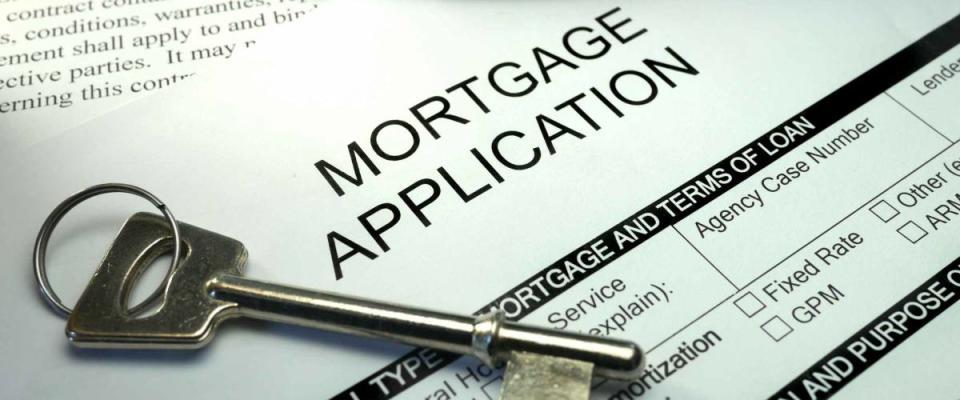 pen and key on mortgage application form