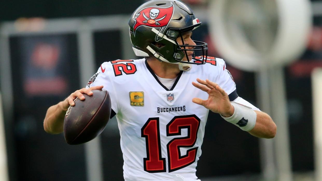 Mandatory Credit: Photo by Brian Blanco/AP/Shutterstock (11017154l)Tampa Bay Buccaneers quarterback Tom Brady (12) warms up before the first half of an NFL football game between the Carolina Panthers and the Tampa Bay Buccaneers, in Charlotte, N.