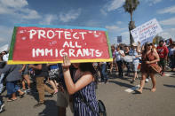 <p>Supporters of the Deferred Action for Childhood Arrivals, or DACA chant slogans and carry signs while joining a Labor Day rally in downtown Los Angeles, Monday, Sept. 4, 2017. (Photo: Richard Vogel/AP) </p>