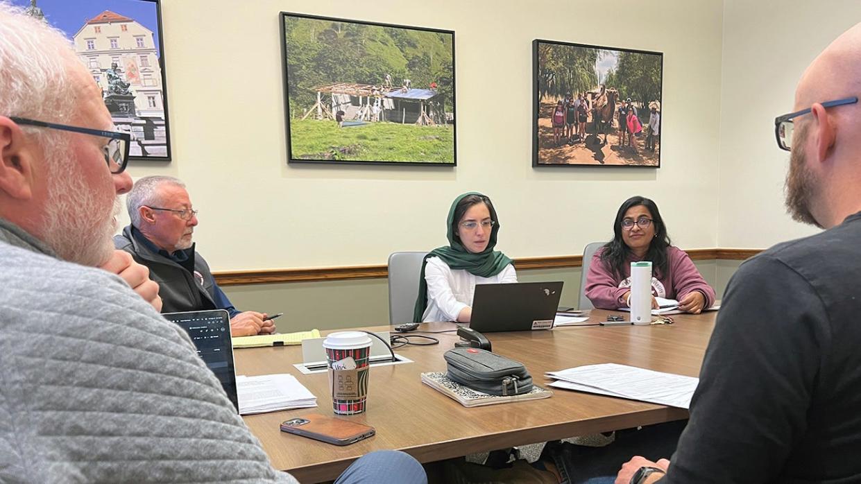 Dr. Mona Ozmaeian, center, is leading a project to encourage more women and minorities in STEM fields following a grant from the U.S. Department of Agriculture. Also working on the project are, clockwise from right, Dr. Swastika Bithi,Dr. Nathan Howell, Dr. Mark Garrison and Dr. David Parker.