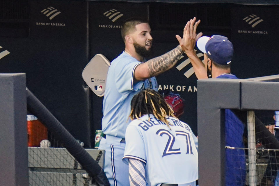 Toronto Blue Jays' pitcher Alek Manoah celebrates with teammates after the sixth inning during the first game of a baseball doubleheader against the New York Yankees Thursday, May 27, 2021, in New York. (AP Photo/Frank Franklin II)