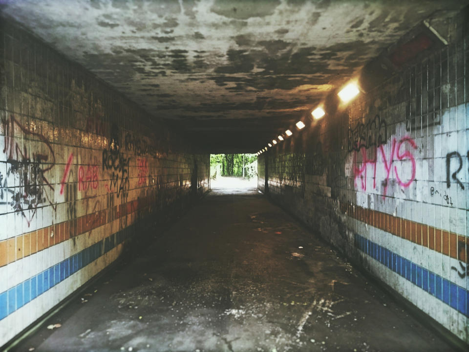 graffiti walls under a bridge