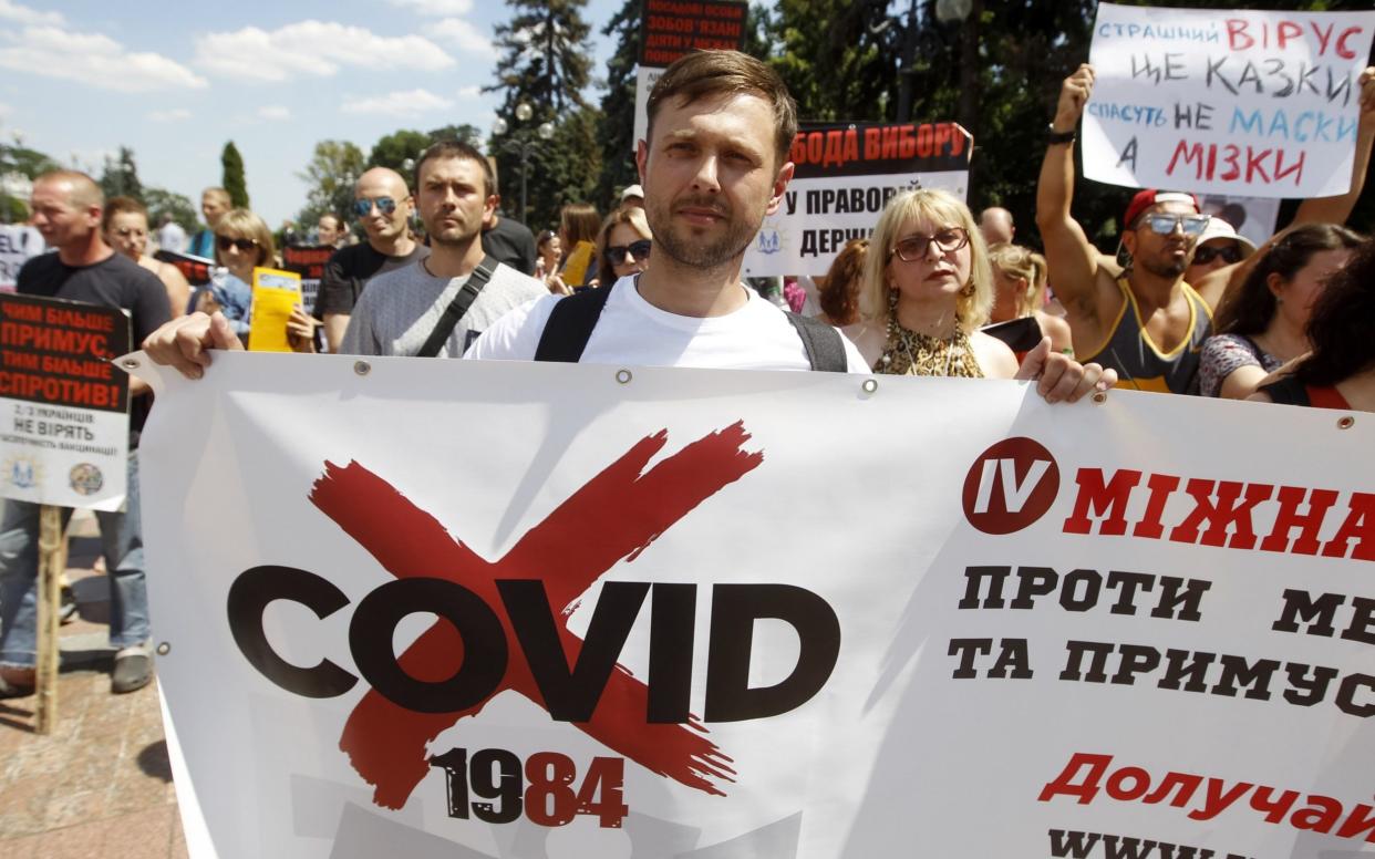 A rally against compulsory vaccines for children in Ukraine - Shutterstock