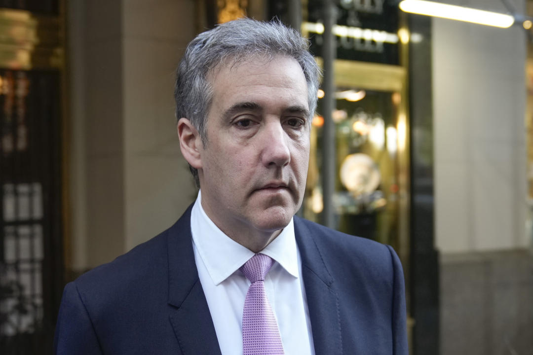 Michael Cohen leaves his apartment on Monday morning as he heads back to testify at Trump's criminal hush money trial. (Seth Wenig/AP)