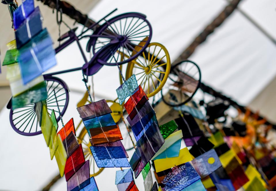 Mobiles hang from the top of a booth at the Mount Dora Craft Fair in 2019.