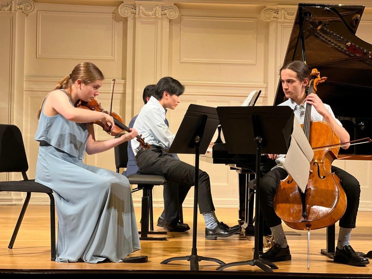 Lily Sullivan, Noah Kim, and Serge Kalinovsky performing recently in Chicago.