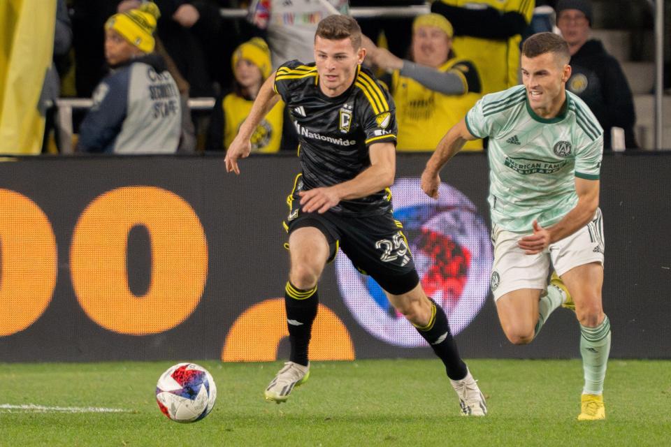 Nov 12, 2023; Columbus, Ohio, USA;
Columbus Crew midfielder Sean Zawadzki (25) runs down the field past Atlanta United defender Brooks Lennon (11) during game three of their series on Sunday, Nov. 12, 2023 at Lower.com Field.