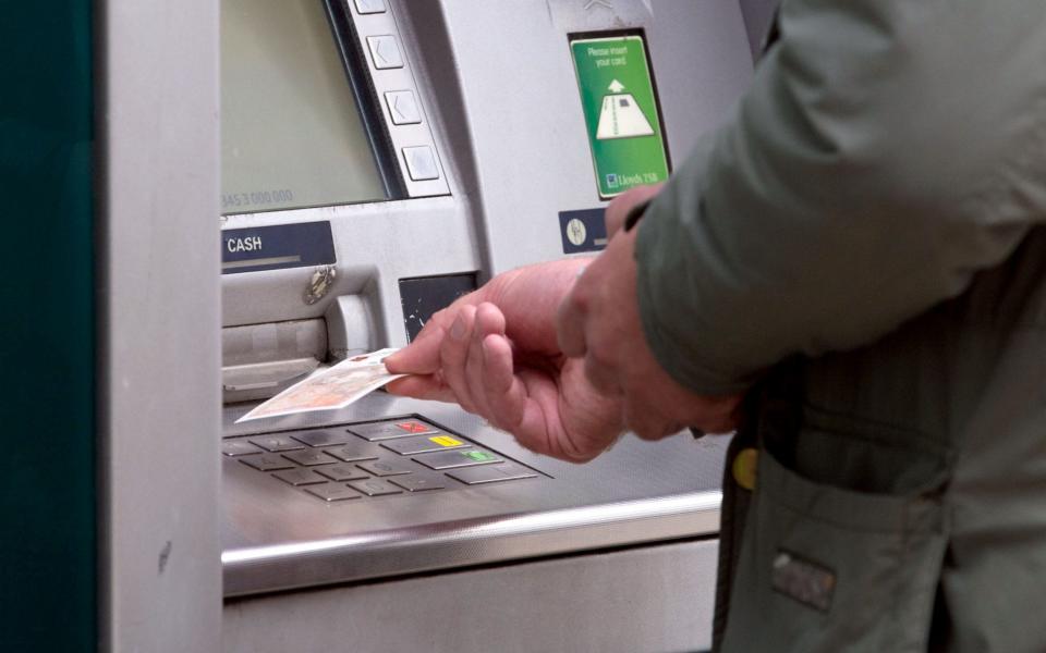 Recent figures show that free ATM machines have been closed at an unprecedented rate in the UK - of around 250 a month - since the beginning of 2018 - PA