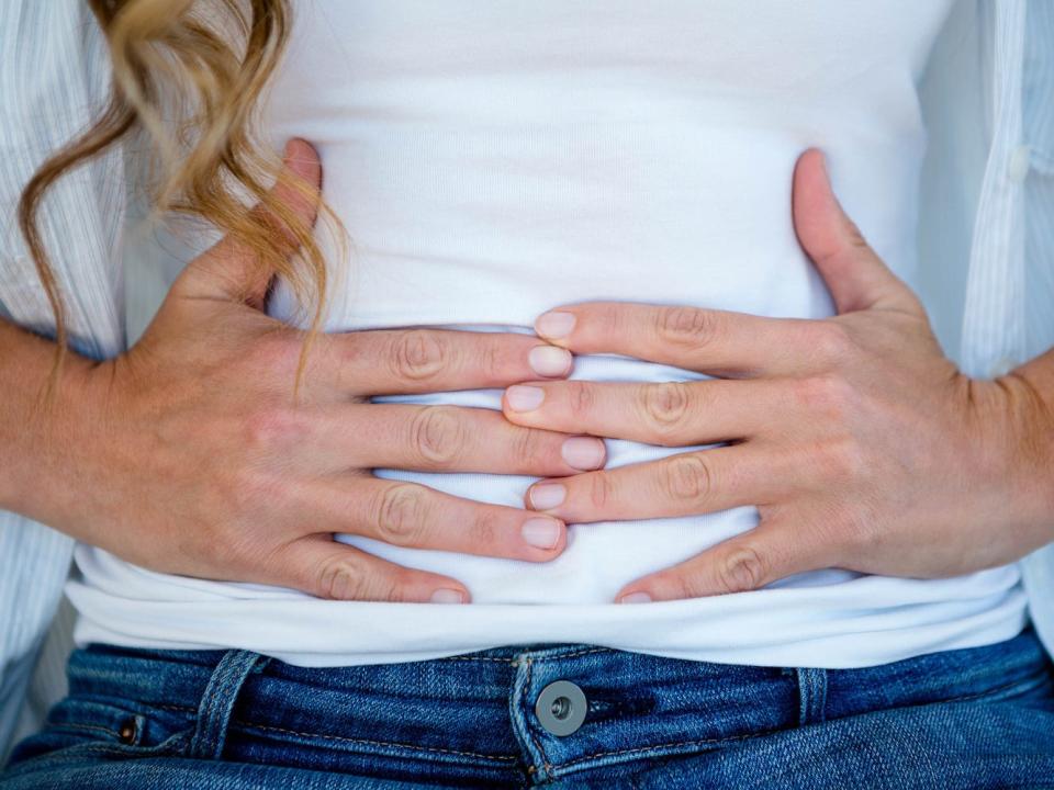 Woman Bloating Stomach Pain