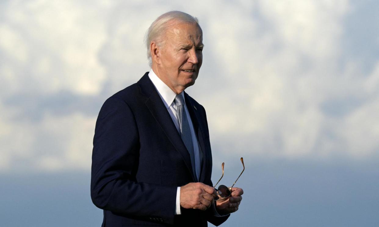 <span>Biden said the pardon was about ‘decency’ and ‘dignity’ for military personnel.</span><span>Photograph: Tiziana Fabi/AFP/Getty Images</span>