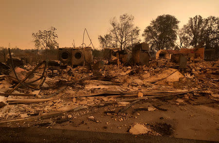 A burned out home in the small community of Keswick is shown from wildfire damage near Redding. REUTERS/Alexandria Sage