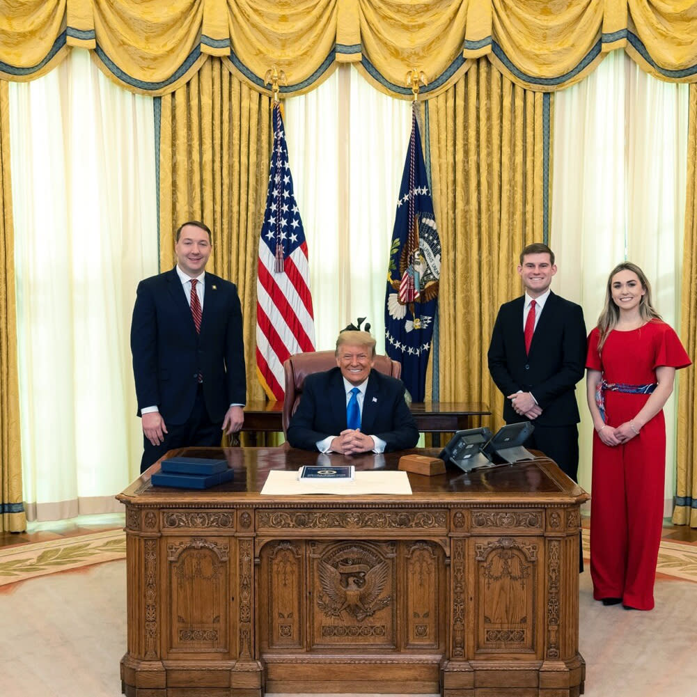 Image: Garrett Ziegler, second right, at the White House with Donald Trump. (White House Photo / Garrett Ziegler via Truth Social)