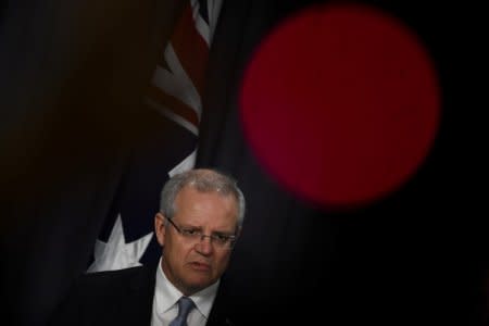 FILE PHOTO - Australian Prime Minister Scott Morrison speaks during a news conference at Parliament House in Canberra, Australia, September 19, 2018. AAP/Lukas Coch/via REUTERS