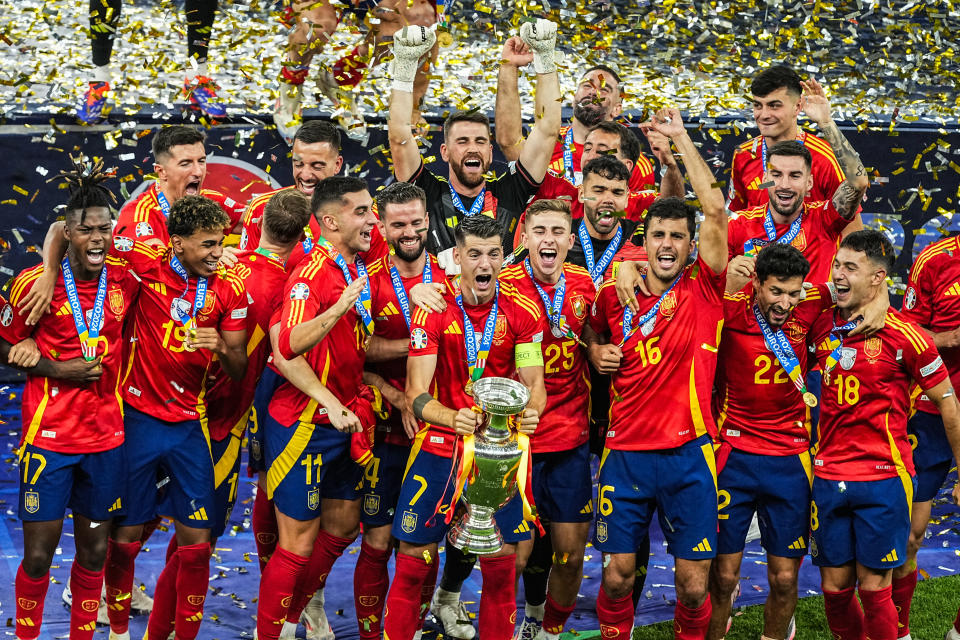 14 July 2024, Berlin: Soccer: European Championship, Spain - England, final round, final, Olympiastadion Berlin, Spain's players cheer with the trophy. Photo: Michael Kappeler/dpa (Photo by Michael Kappeler/picture alliance via Getty Images)