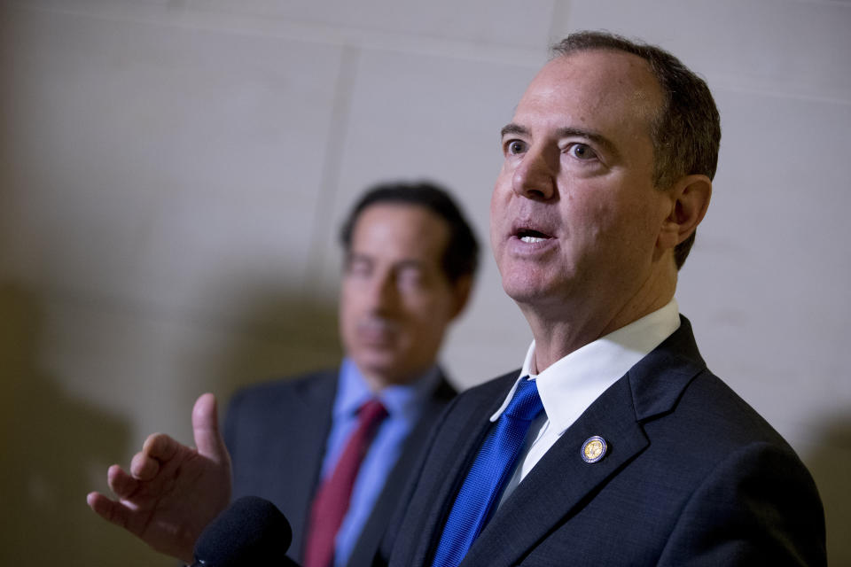 Rep. Adam Schiff, D-Calif., Chairman of the House Intelligence Committee, accompanied by Rep. Jamie Raskin, D-Md., left, speaks to reporters about the ongoing House impeachment inquiry into President Donald Trump on Capitol Hill in Washington, Monday, Nov. 4, 2019. (AP Photo/Andrew Harnik)