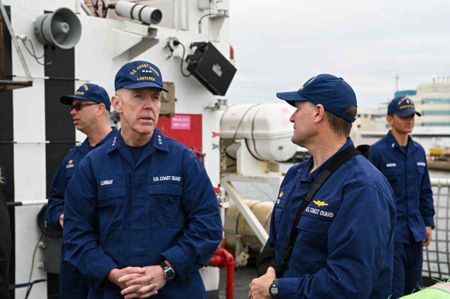 Vice Adm. Lunday, Commander of Coast Guard Atlantic Area, speaking with the commanding officer of the Coast Guard Cutter Resolute, Lt. Cmdr. Ross, on Jan. 29, 2024, St. Petersburg, FL. Lunday and Ross discussed the events of the patrols and resulting drug interdictions. (U.S. Coast Guard photo by Petty Officer 3rd Class Nicholas Strasburg)