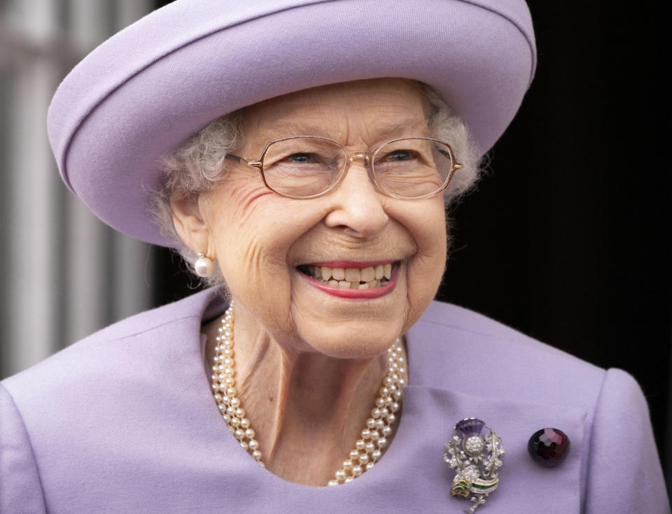 The Queen attends an Armed Forces Act of Loyalty Parade at the Palace of Holyroodhouse in Edinburgh, Scotland, on June 28, 2022. - Queen Elizabeth II has travelled to Scotland for a week of royal events. (Photo by Jane Barlow / POOL / AFP) (Photo by JANE BARLOW/POOL/AFP via Getty Images)