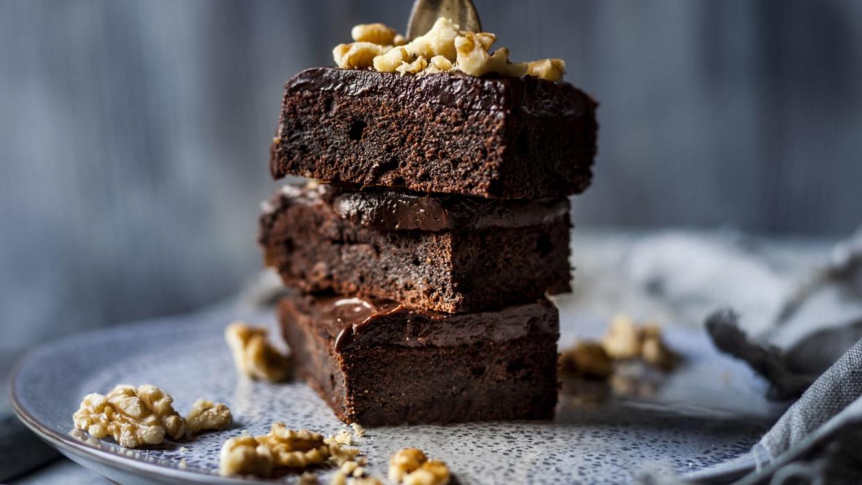 stack of homemade gluten free brownies with chocolate and coffee glazing