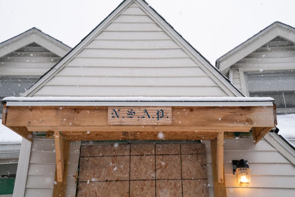 A house sits unoccupied on Terry Street in Detroit Wednesday, Jan. 25, 2023 after the Michigan State Police fatally shot a male who allegedly targeted an aviation unit from the property Tuesday, Jan. 24, 2023.