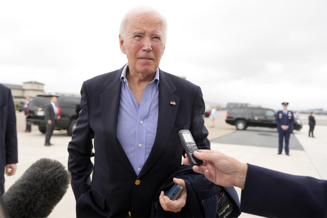 President Joe Biden speaks to reporters before boarding Air Force One at Dover Air Force Base, in Dover, Del., Sunday, Sept. 29, 2024, to return to Washington. (AP Photo/Manuel Balce Ceneta)