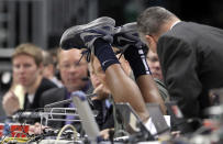 PITTSBURGH, PA - MARCH 17: Scoop Jardine #11 of the Syracuse Orange dives heads first over the scorer's table after a looks ball against the Kansas State Wildcats during the third round of the 2012 NCAA Men's Basketball Tournament at Consol Energy Center on March 17, 2012 in Pittsburgh, Pennsylvania. (Photo by Gregory Shamus/Getty Images)