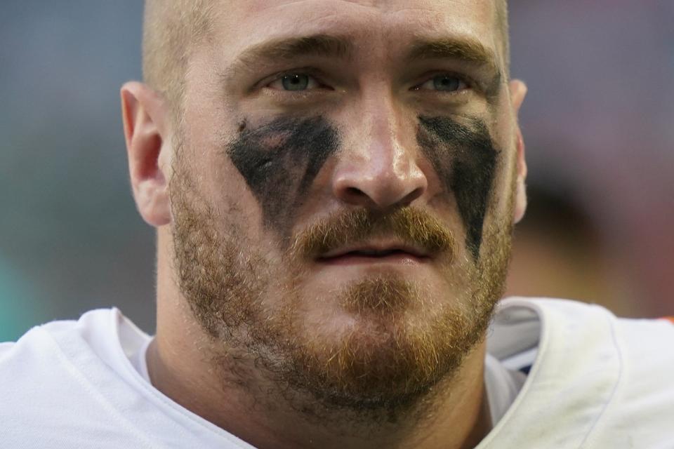 Miami Dolphins offensive tackle Liam Eichenberg (74) walks on the sideline during the second half of an NFL football game against the Buffalo Bills, Sunday, Sept. 19, 2021, in Miami Gardens, Fla. (AP Photo/Wilfredo Lee)