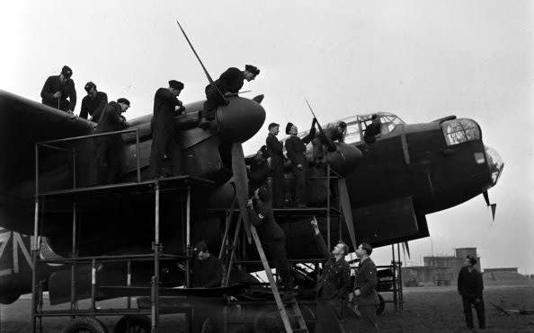 England, 1942: Repairs are carried out on a Lancaster Bomber - Popperfoto