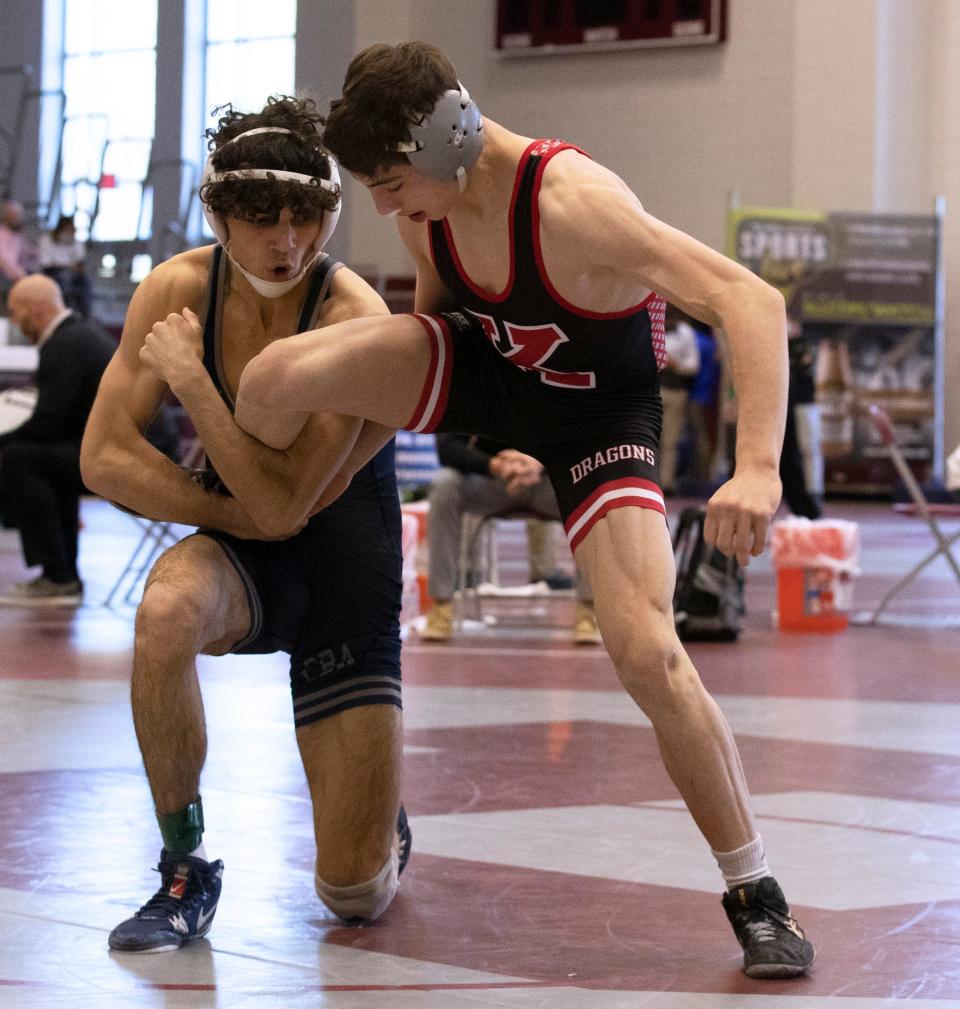 Christian Brothers Academy's Julian George (left), shown wrestling Kingsway's Josh Palmucci in an NJSIAA 132-pound pre-quarterfinal-round bout last April 24 at Phillipsburg High School, will move up to 138 pounds this season.