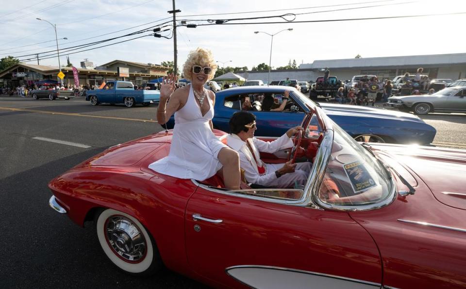 Classic car owners cruise down McHenry Avenue during the Graffiti Parade in Modesto, Calif., Friday, June 9, 2023. Andy Alfaro/aalfaro@modbee.com