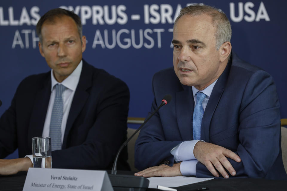 Israel's Energy Minister Yuval Steinitz, right, speaks next to U.S. Assistant Secretary of State of Energy Francis Fannon during a summit in Athens, on Wednesday, Aug. 7, 2019. Ministers of Greece , Cyprus Israel and US participated Wednesday in the first Energy Ministerial Summit. (AP Photo/Petros Giannakouris)