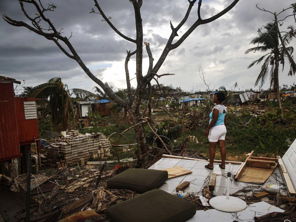 Mirian Medina stands on her property about two weeks after Hurricane Maria in Puerto Rico..