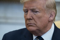 President Donald Trump listens during a meeting with Israeli Prime Minister Benjamin Netanyahu in the Oval Office of the White House, Monday, Jan. 27, 2020, in Washington. (AP Photo/ Evan Vucci)