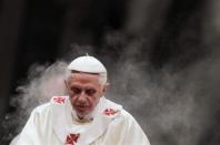 Pope Benedict XVI attends a Mass celebrating the 200th anniversary of the independence of Latin American countries at St. Peter's Basilica December 12, 2011.