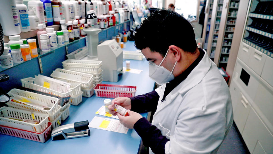 IMAGE: Shane Jerominski at work in his pharmacy. (NBC News)