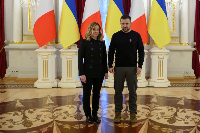 Ukraine's President Zelenskiy and Italian PM Meloni pose for a picture before a meeting in Kyiv