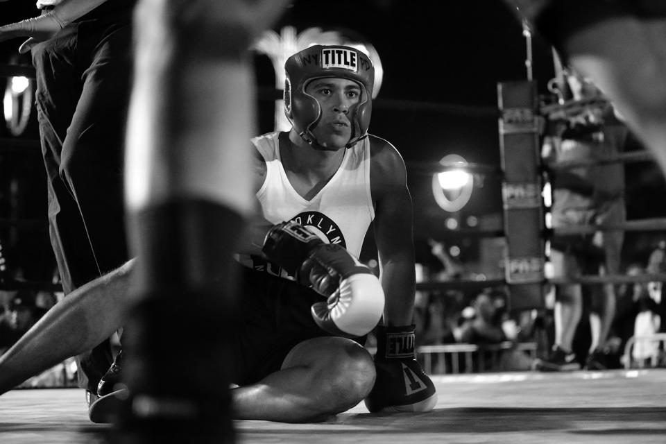 <p>Jared Martinez looks around after getting knocked to the deck by opponent Eddie Aguilar at the Brooklyn Smoker in Coney Island, Brooklyn, on Aug. 24, 2017. (Photo: Gordon Donovan/Yahoo News) </p>