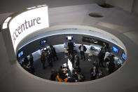 Attendees are seen in one of the pavilion of the Mobile World Congress.