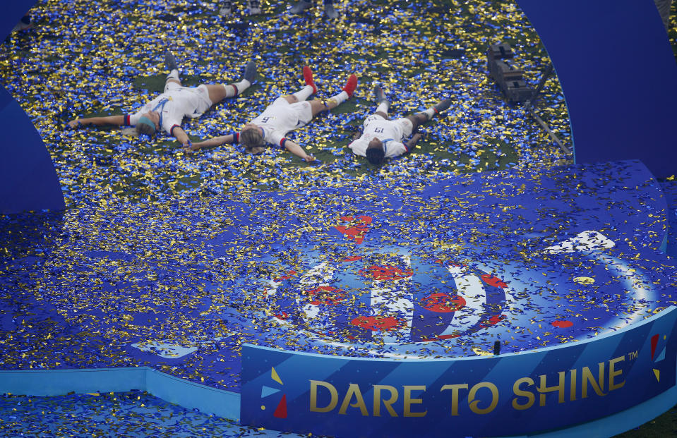 Players of the US team celebrate after winning the Women's World Cup final soccer match between US and The Netherlands at the Stade de Lyon in Decines, outside Lyon, France, Sunday, July 7, 2019. (AP Photo/Francois Mori)