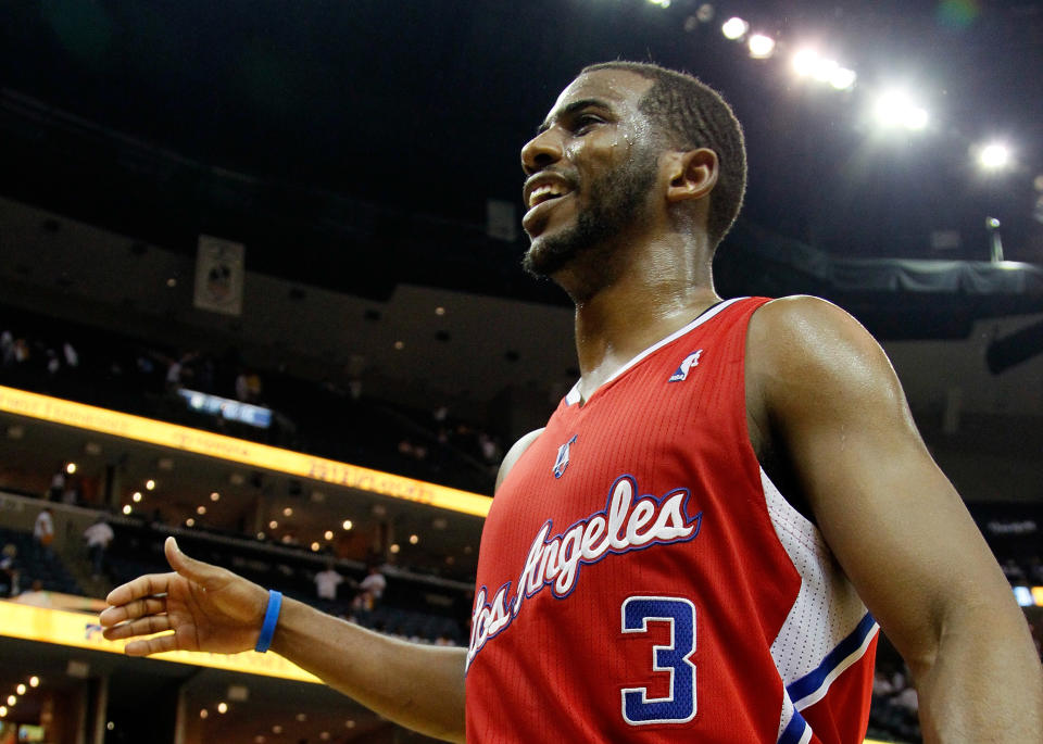 MEMPHIS, TN - MAY 13: Chris Paul #3 of the Los Angeles Clippers celebrates after their 82-72 win over the Memphis Grizzlies in Game Seven of the Western Conference Quarterfinals in the 2012 NBA Playoffs at FedExForum on May 13, 2012 in Memphis, Tennessee. NOTE TO USER: User expressly acknowledges and agrees that, by downloading and or using this photograph, User is consenting to the terms and conditions of the Getty Images License Agreement (Photo by Kevin C. Cox/Getty Images)