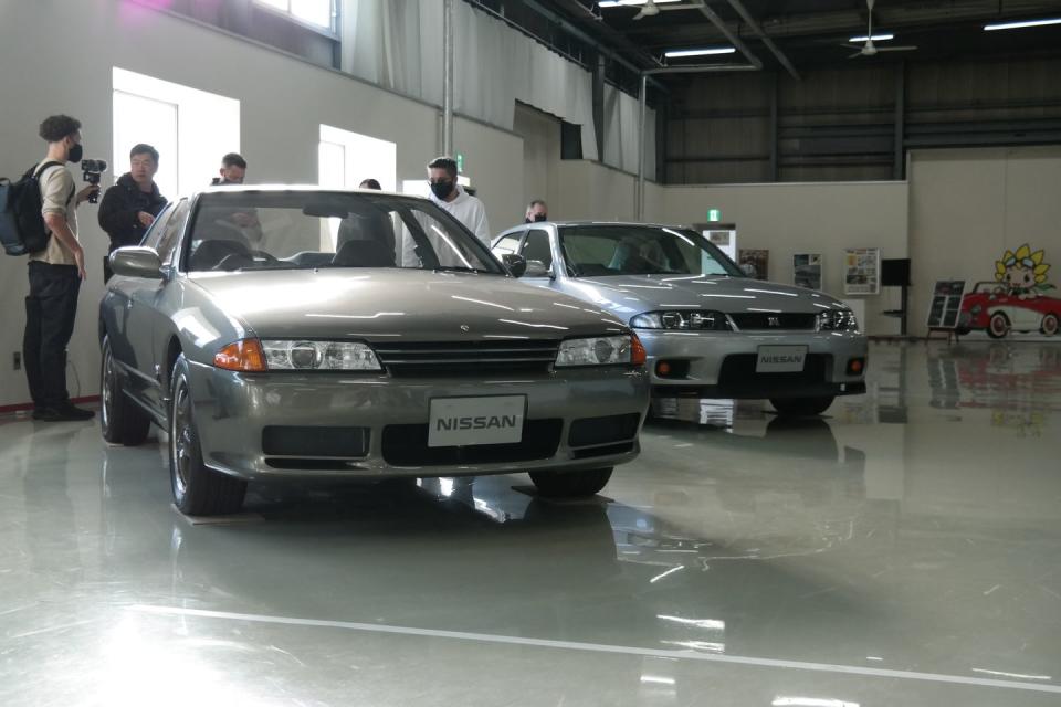 <p>Walk in and you're greeted to a reception desk and two of Nissan's funkiest creations: Autech-developed Skyline sedans with twin-turbo RB26 engines from their respective GT-R siblings. </p>