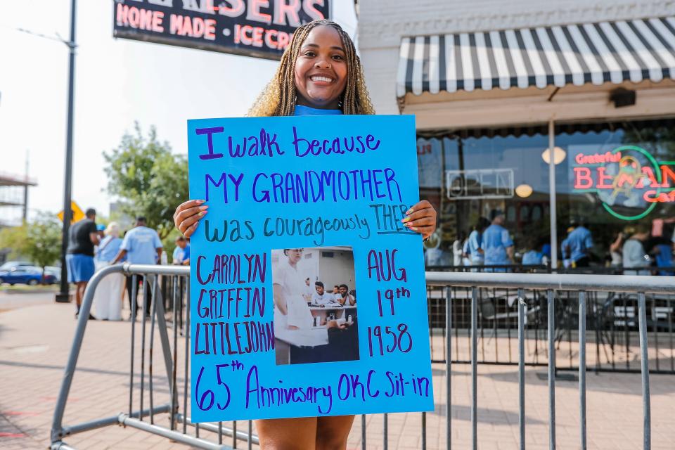 Danielle Pullen participates Saturday in a reenactment that included a march from Frontline Church and a sit-in at Kaiser's Grateful Bean during the observation of the 65th anniversary of the Oklahoma City civil rights movement.