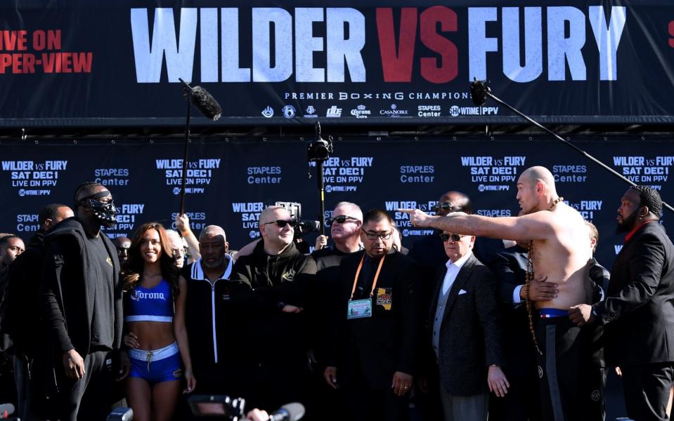 Wilder and Fury on stage at the weigh-in - Getty Images North America