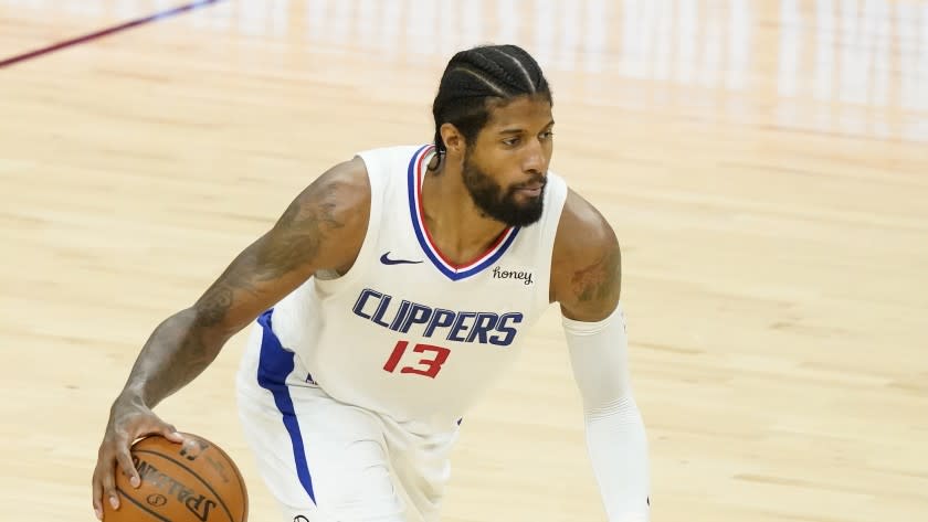 Los Angeles Clippers guard Paul George (13) against the Phoenix Suns during the second half.