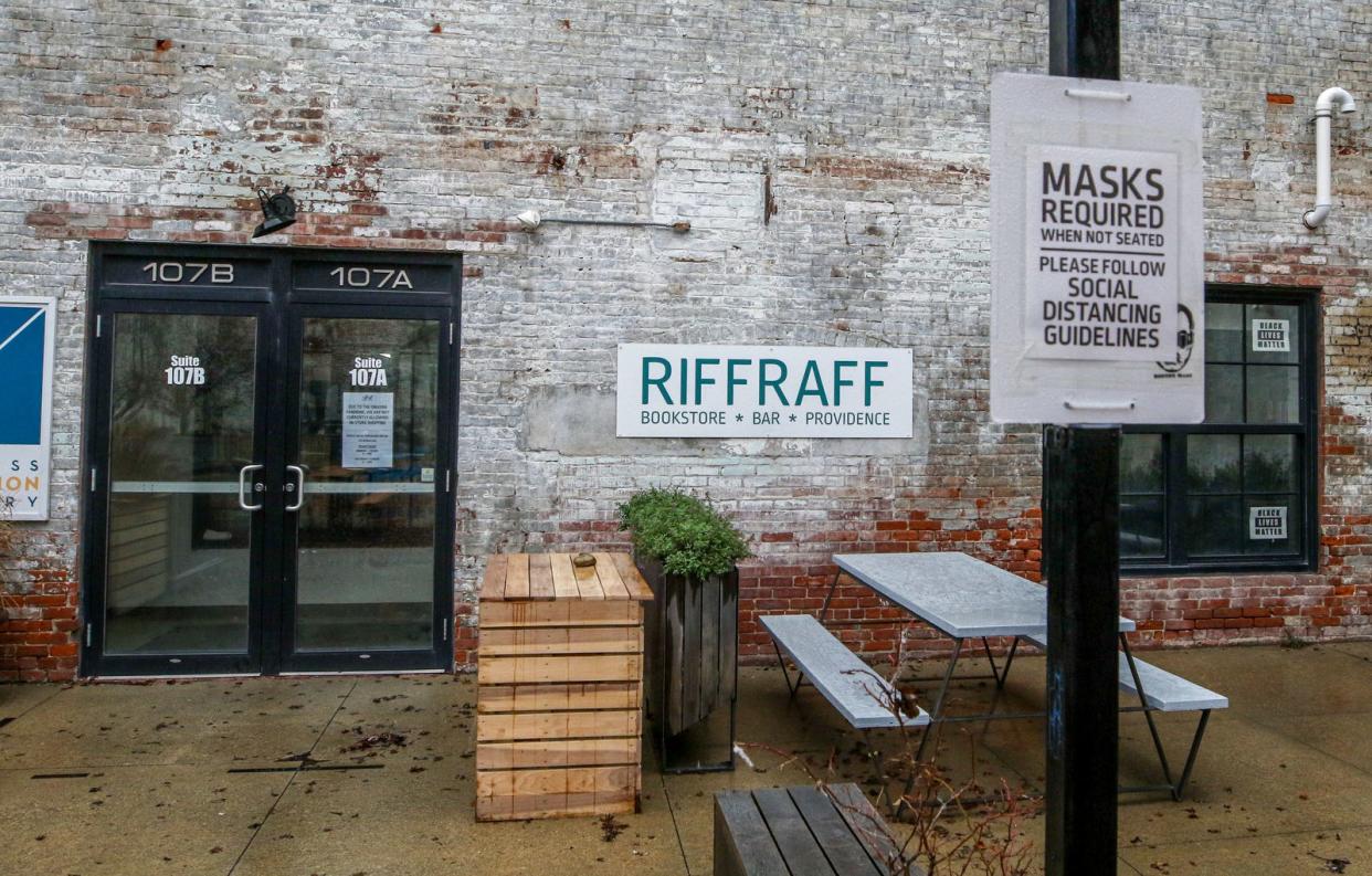 The entrance to Riffraff, located in a converted mill complex in Olneyville, in 2020. The courtyard space is a popular spot for patrons to read and sip beverages.