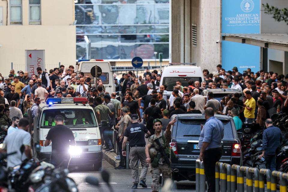 Ambulances surrounding the entrance of a hospital after the pagers detonated (AFP via Getty Images)