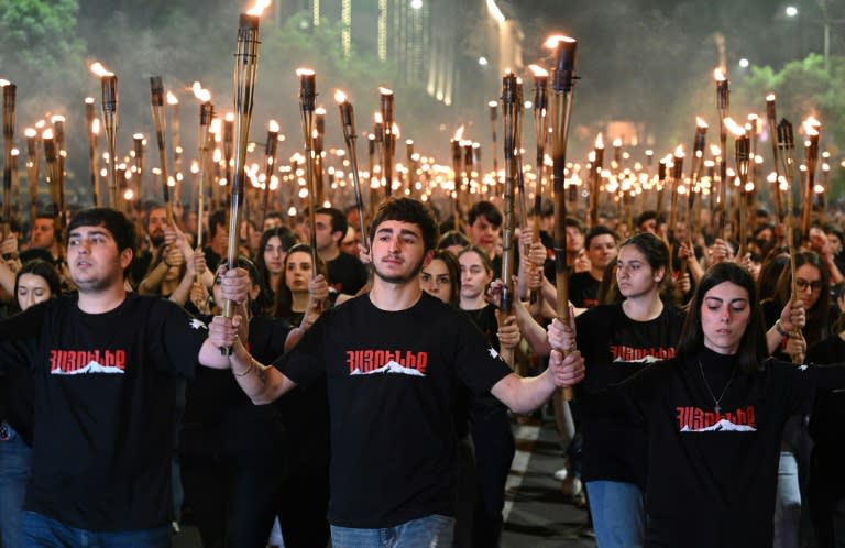 More than 10,000 Armenians took part in an annual torch march on the eve of the Genocide Remembrance Day in Yerevan (KAREN MINASYAN)