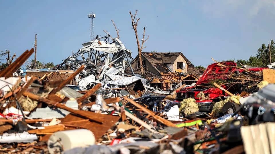 Debris covers a residential area in Perryton, Texas, after a tornado struck the area Thursday. - David Erickson/AP